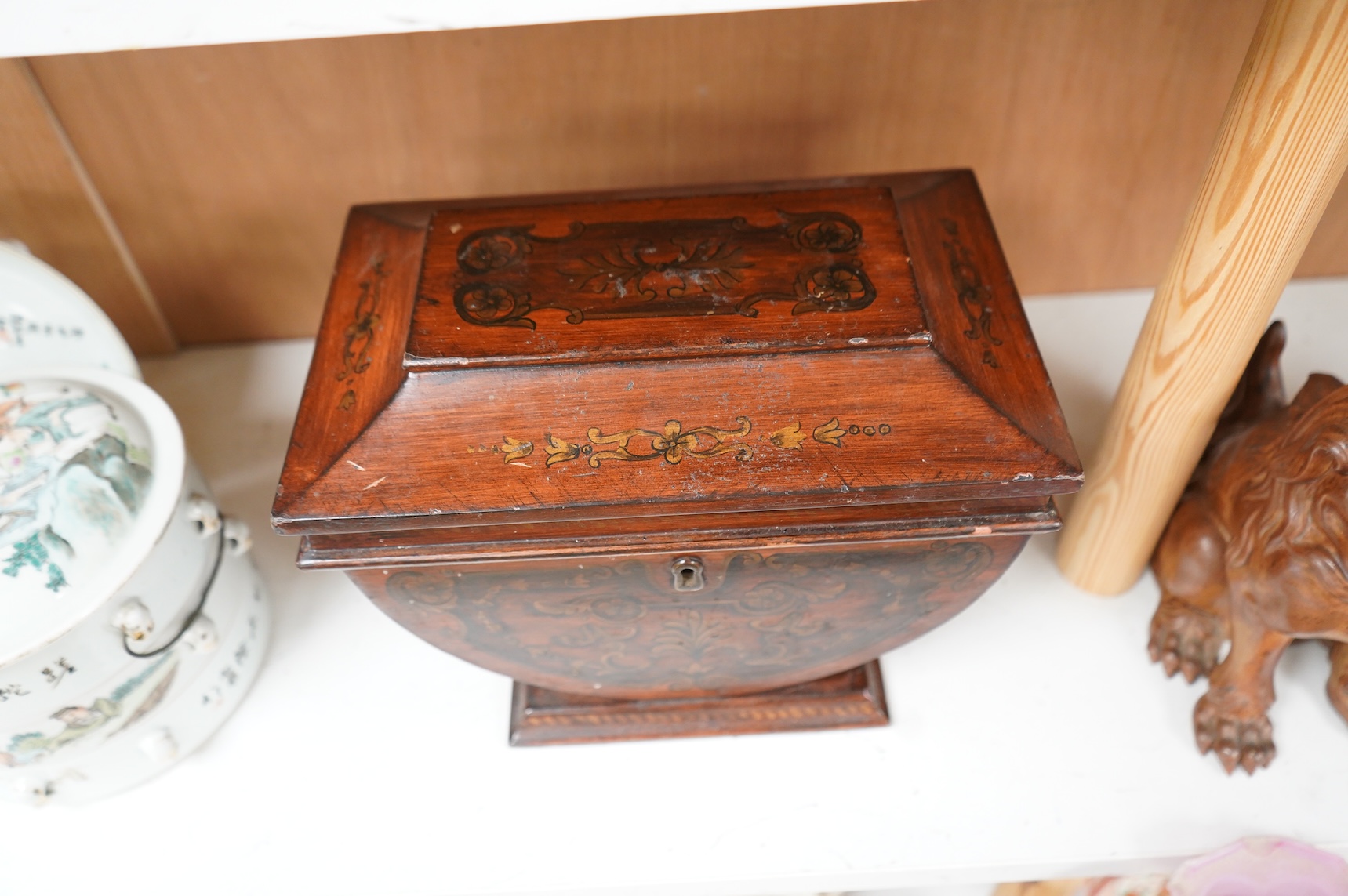 A late 19th century Grecian revival mahogany and penwork sarcophagus shaped tea caddy, 28cm wide